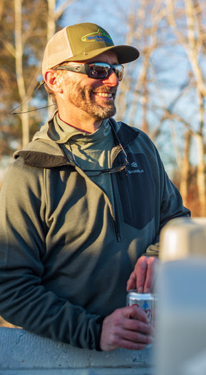Enjoying a cold Coors Light after a day on the river in the Thermo 150 and 350 Hoodies from Skwala Fishing.