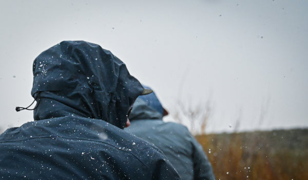 Staying dry during a spring hail storm in Wyoming with the RS and Carbon Jackets.