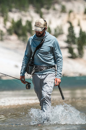 Wet wading in the Sol Hoody and Sol Wet Wading Pant on the Yellowstone River in Yellowstone National Park. 