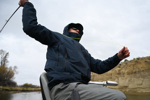 Casting from the front seat of a raft in the RS Jacket.