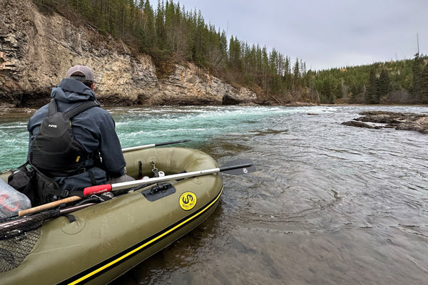 Prepping to swing the next steelhead run while wearing the RS Jacket and Waders. 