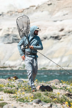 Walking the banks of the Yellowstone River in the Sol Hoody and Sol Wet Wading Pants in Yellowstone National Park